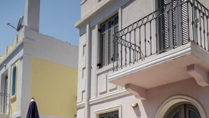 A building with a balcony, a door, and a window. - Villa Thalia Thassos Island Limenaria Greece (Thasos)