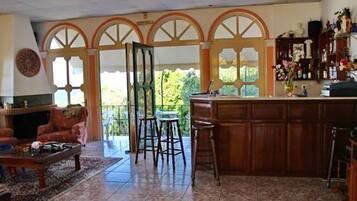 Room, 1 Bedroom, Balcony | Bar (on property)