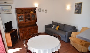 Appartement, 1 chambre, terrasse, vue sur le jardin | Aire de séjour
