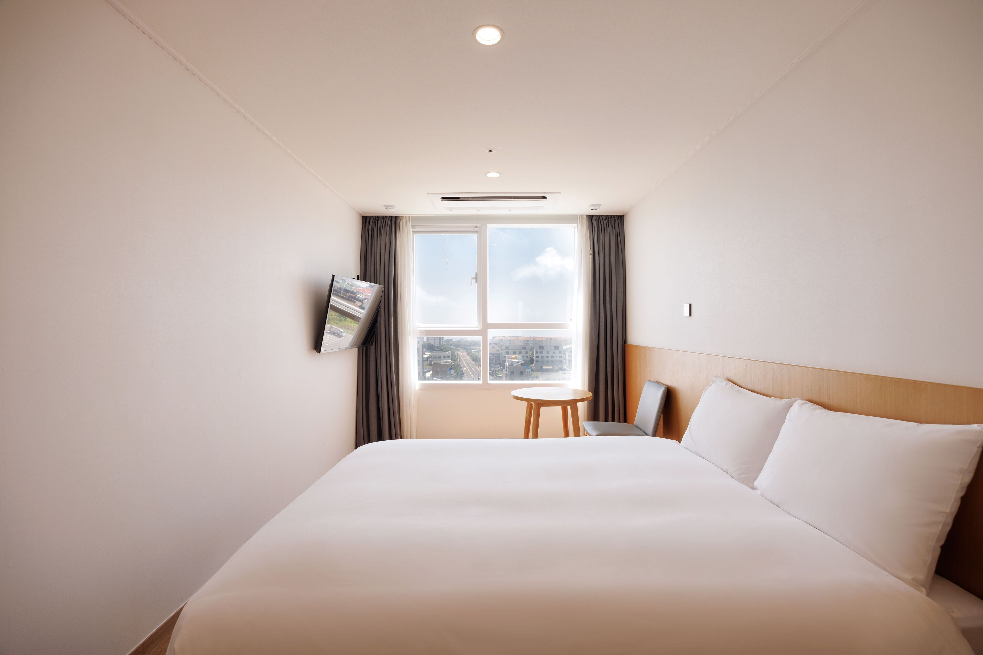 deluxe double room | premium bedding, down duvets, desk, laptop workspace
