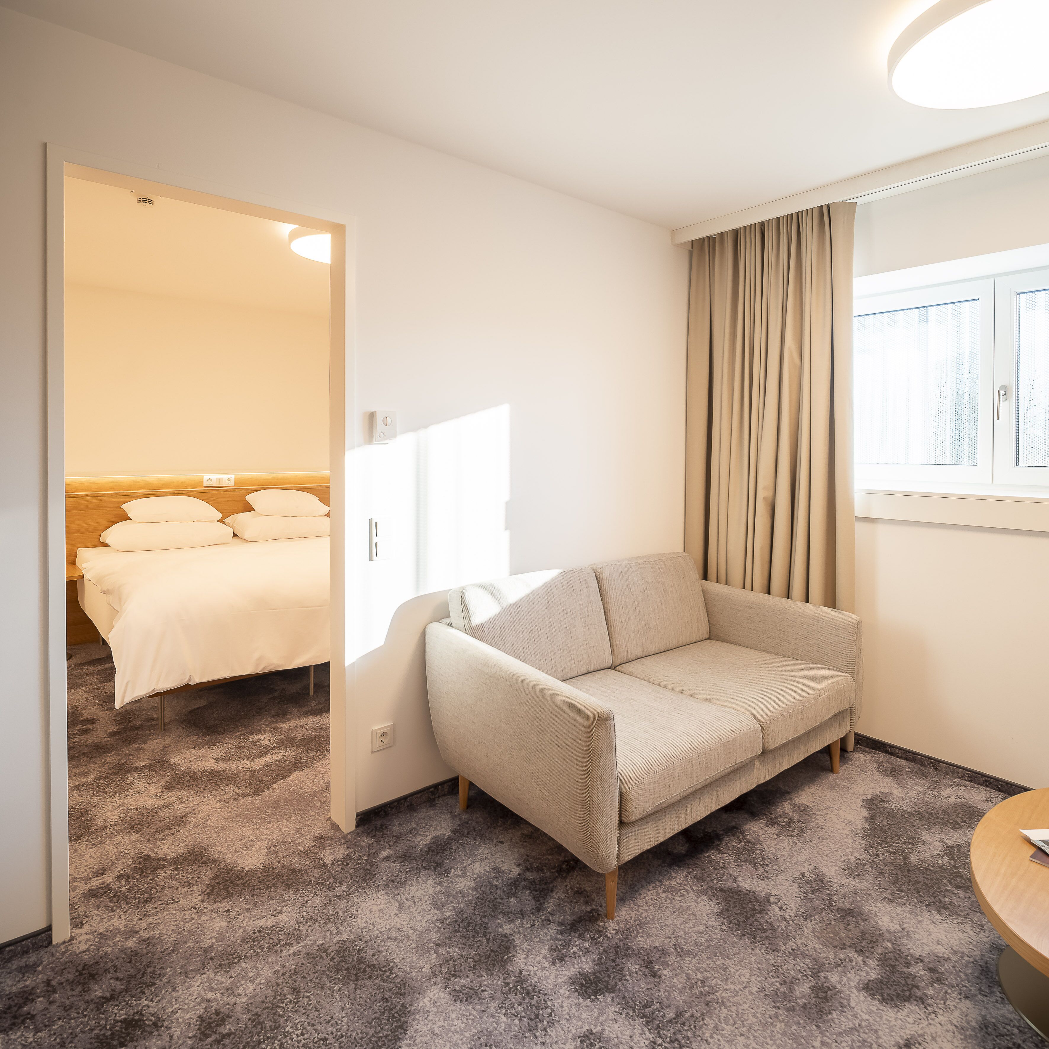 Deluxe Room | Living area | Flat-screen TV