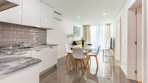 Apartamento Deluxe | Zona de estar