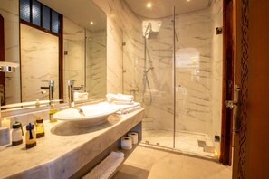 Shower, free toiletries, hair dryer, slippers