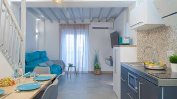 Apartment, 2 Bedrooms, Terrace | Living area | Flat-screen TV