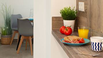 Apartment, 1 Bedroom, Balcony | Private kitchen | Full-sized fridge, microwave, stovetop, electric kettle