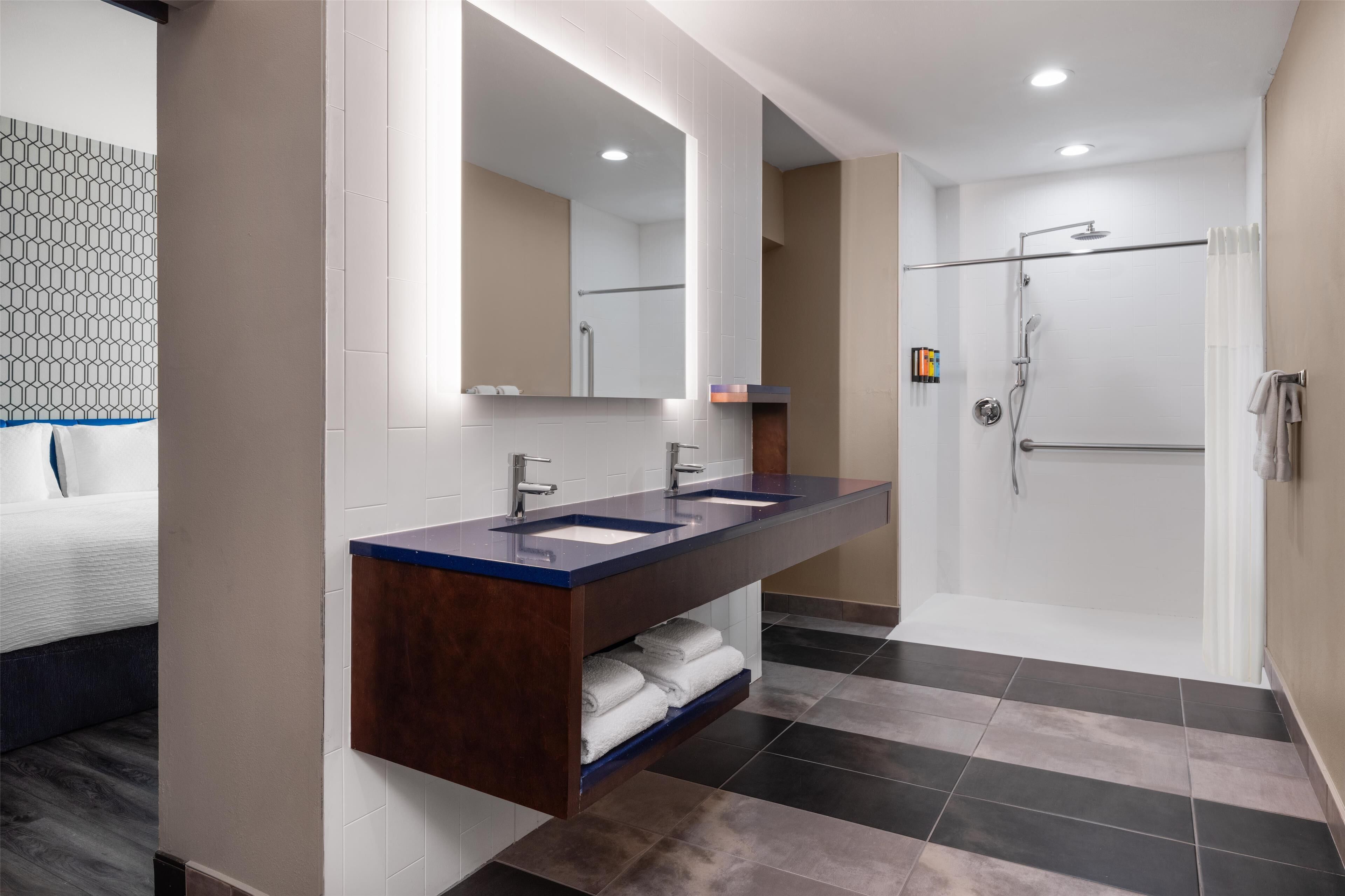 standard room, 1 king bed, accessible, refrigerator & microwave | bathroom | shower, free toiletries, hair dryer, towels