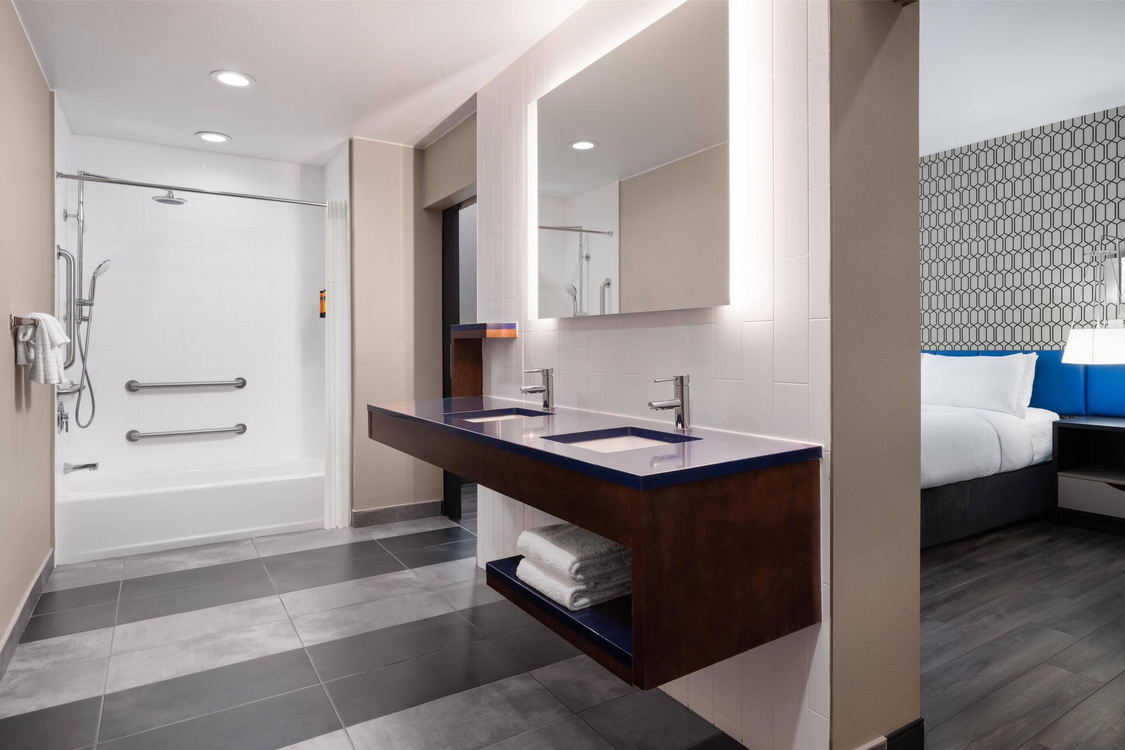 shower, free toiletries, hair dryer, towels