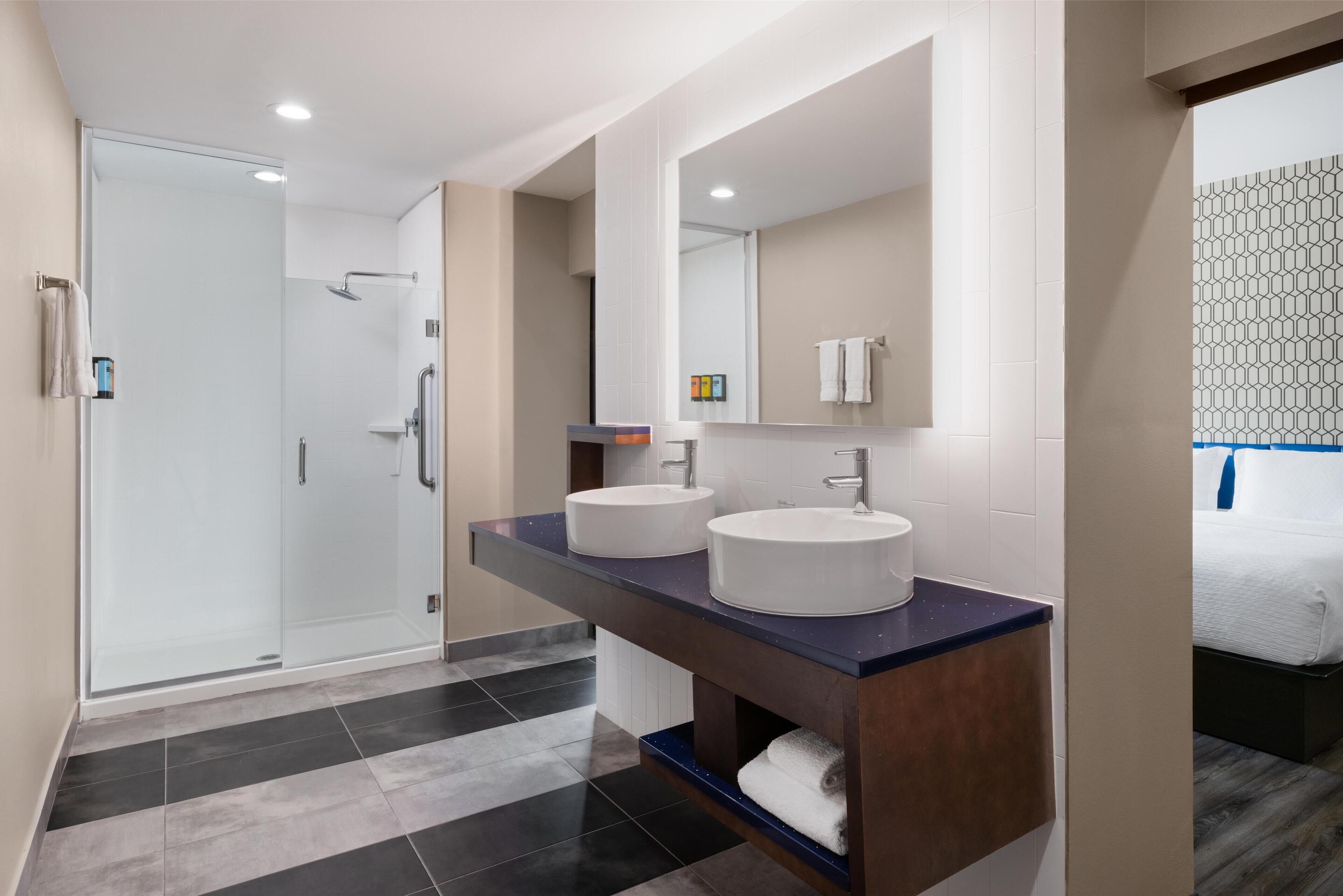 shower, free toiletries, hair dryer, towels