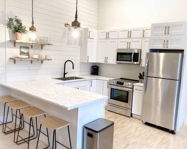 Cookware/dishes/utensils - Renovated Townhouse On The Water #5 (Chassell Township)