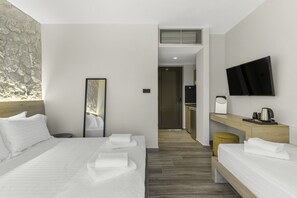 Deluxe-Dreibettzimmer | Hochwertige Bettwaren, Pillowtop-Betten, individuell dekoriert