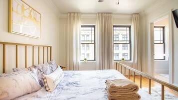 2 bedrooms, desk, iron/ironing board, travel crib