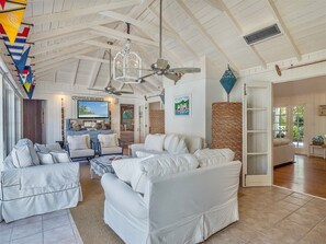 House (Palmflower House) | Living room | Flat-screen TV - Palmflower House (Captiva)
