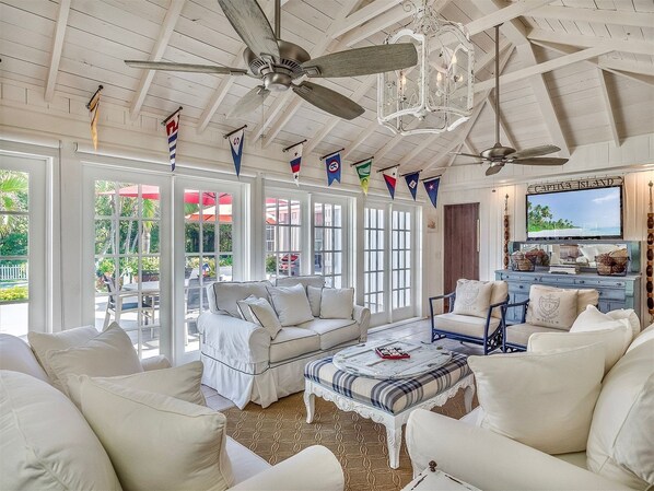 House (Palmflower House) | Living room | Flat-screen TV - Palmflower House (Captiva)