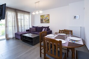 Family Apartment, 2 Bedrooms, Non Smoking, City View | Living area | 32-inch LCD TV with digital channels, TV