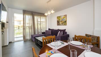 Family Apartment, 2 Bedrooms, Non Smoking, City View | Living area | 32-inch LCD TV with digital channels, TV