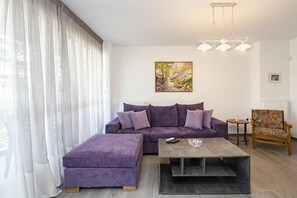 Family Apartment, 2 Bedrooms, Non Smoking, City View | Living area | 32-inch LCD TV with digital channels, TV