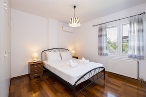 2 bedrooms, desk, laptop workspace, iron/ironing board