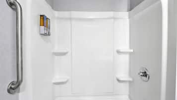 Bathtub, hair dryer, towels, soap