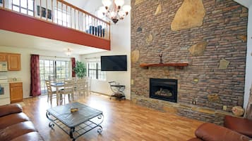 TV connectée, cheminée, table de tennis de table, espaces bureaux