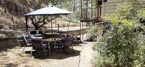 Outdoor dining - Meyenburg King bed tent with shared outdoor shower & wc (Mount Morgan)