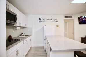 Fridge, microwave, oven, stovetop - Heart of Downtown 1 bedroom 1 bath condo 1 reserved parking (Honolulu)