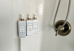 Shower, hair dryer, towels, soap