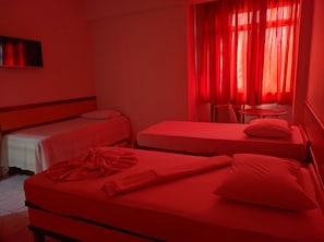 Desk, laptop workspace, free WiFi, bed sheets