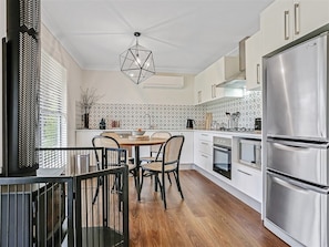 Fridge, microwave, oven, stovetop - Elysium Cottage - A Cosy Retreat with Water Views (Fitzroy Falls)