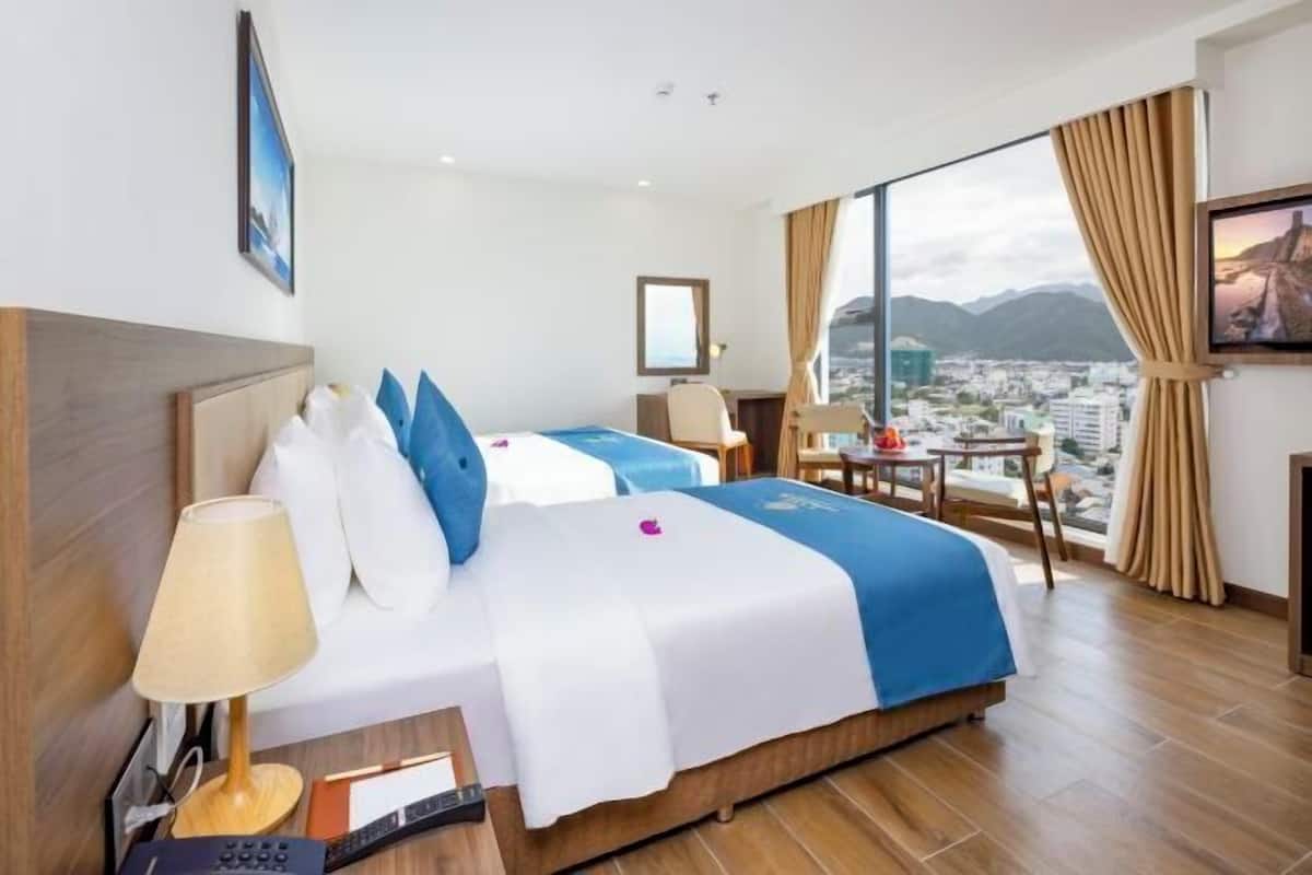 Premium bedding, free minibar items, in-room safe, desk