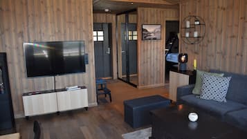 Family Cabin, 3 Bedrooms | Living area | 30-cm TV with satellite channels