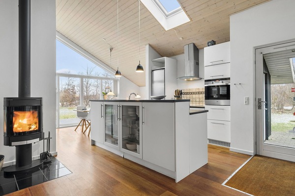 Fridge, stovetop, dishwasher, coffee/tea maker