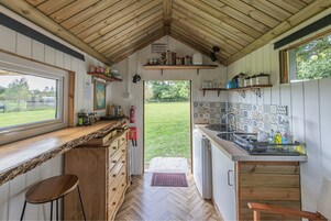 Family Cabin, Private Bathroom, Garden View (Not en suite) | Private kitchen | High chair