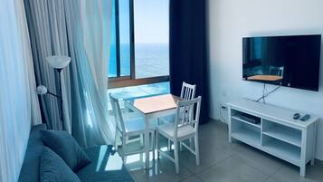 Family Apartment | Premium bedding, desk, laptop workspace, blackout drapes