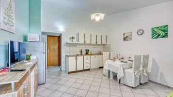 Family Apartment, 1 Bedroom, Mountainside (Turquoise Apartment Sea View) | Private kitchen | Fridge, microwave, oven, stovetop