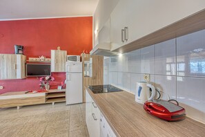 Family Apartment, Multiple Bedrooms, Mountainside (Cherry Apartment With Sea View) | Private kitchen | Fridge, microwave, oven, stovetop