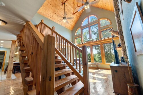 Kim's Cove Motorcycle-Friendly Cabin features Game Room by RedAwning