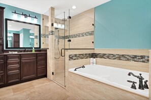 Combined shower/tub, hair dryer, towels, soap