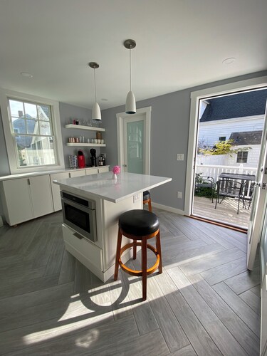 Stylish Ptown Condo with driveway parking, waterviews and prime location!