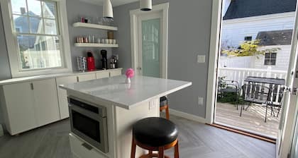 Stylish Ptown Condo with driveway parking, waterviews and prime location!