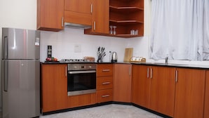 Apartment, Multiple Beds | Private kitchen | Coffee/tea maker, fridge, microwave, oven - Deluxe 3-bed Apartment With Swimming Pool (Kampala)
