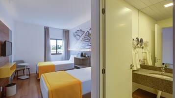 Standard Twin Room, 2 Twin Beds | Minibar, in-room safe, individually furnished, blackout drapes