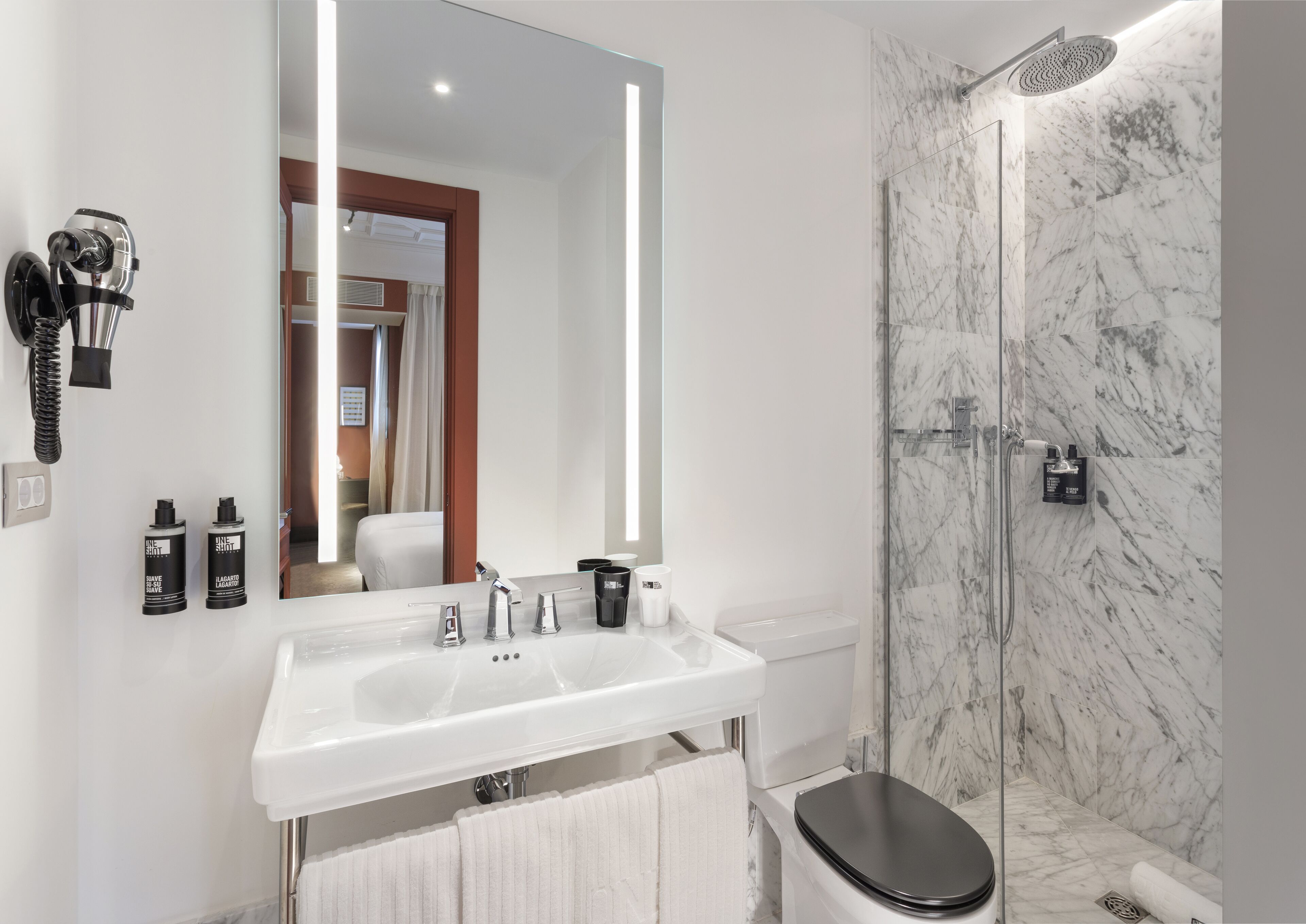 economy room | bathroom | shower, rainfall showerhead, hair dryer, towels