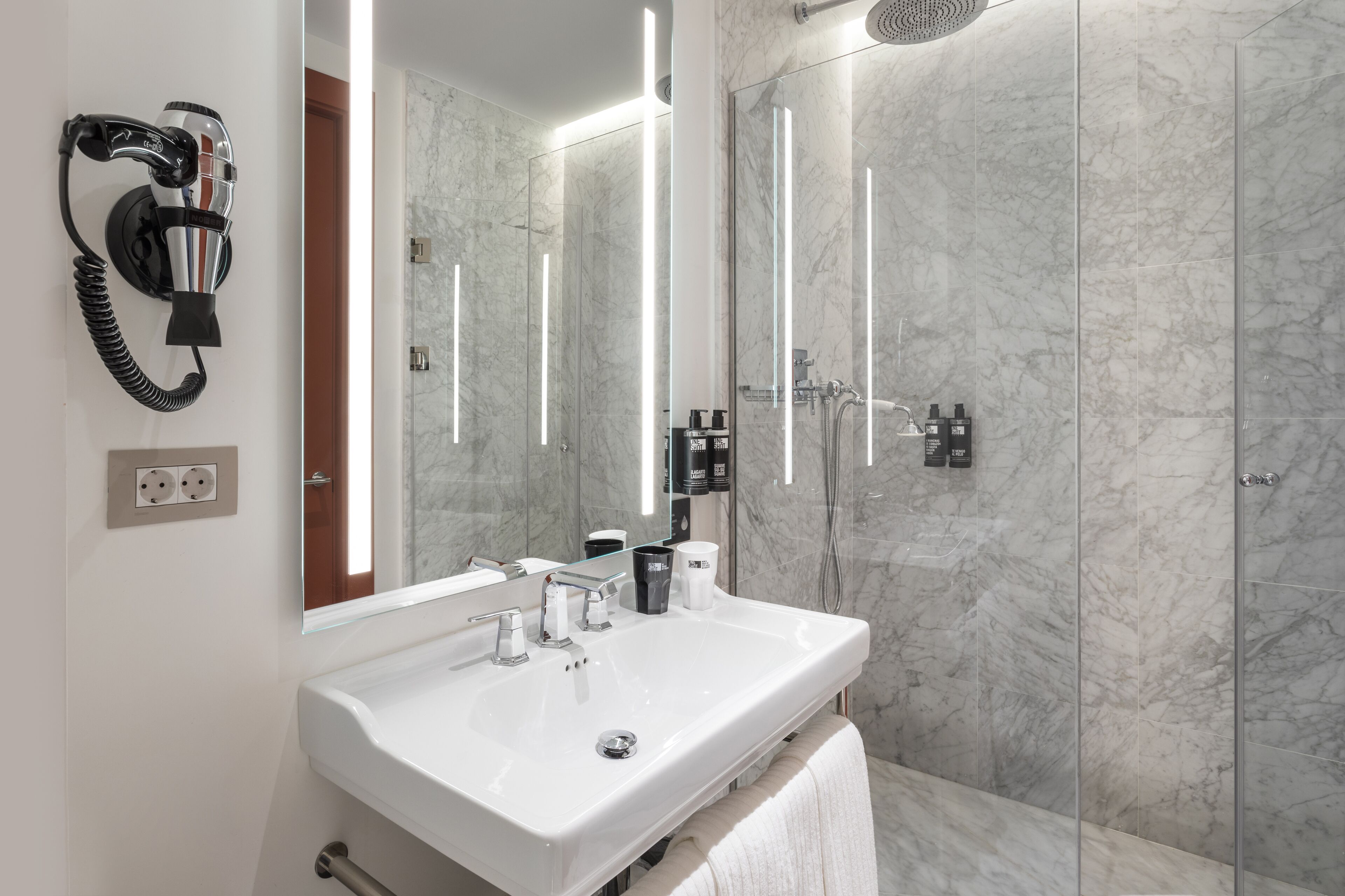 standard room | bathroom | shower, rainfall showerhead, hair dryer, towels