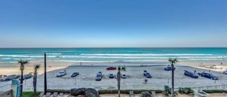 On the beach, sun-loungers, beach towels