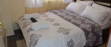 1 chambre, fer et planche Ă repasser, Wi-Fi, draps fournis