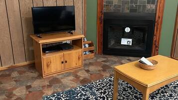 Smart TV, chimenea, videojuegos, reproductor de DVD