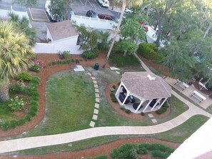 residential area with a gazebo and well-manicured lawns.