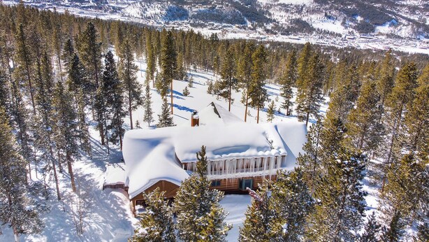 A cabin surrounded by snow-covered trees and mountains. - Welcome to Lucky Us Cabin! Private + Close to Town (Breckenridge)