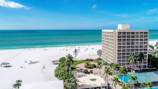 A beachfront hotel with a pool, beach, and ocean view. - Palm Bay Club Bayside Closest to Gulf (Siesta Key)