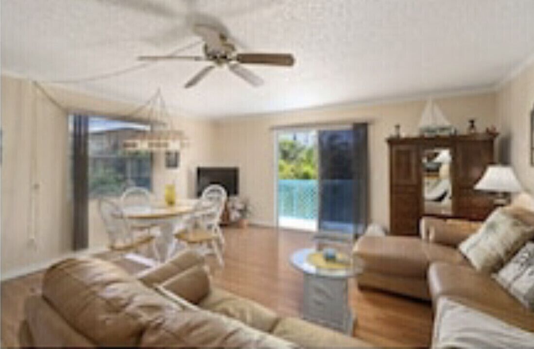 Steps to the beach and park. This is the rear unit with private deck! 